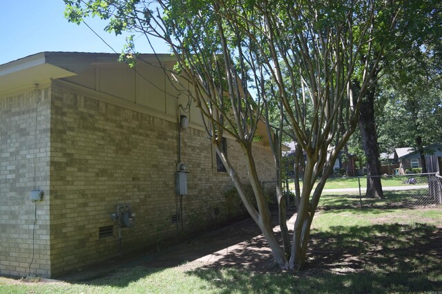 206 Beaconsfield Rd, Sherwood, AR 72120 - view of side of home featuring brick siding and crawl space