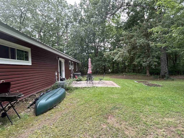 99 Heritage Hl, Higden, AR 72067 - view of grassy yard with a patio area