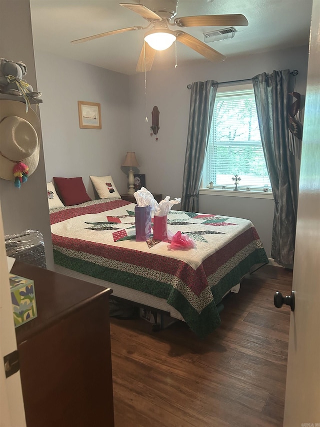 99 Heritage Hl, Higden, AR 72067 - bedroom with wood finished floors and ceiling fan