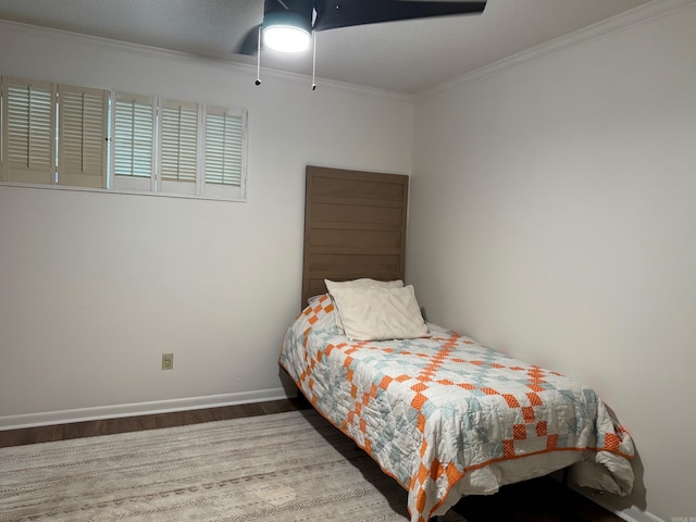 28 Timothy Ln, Conway, AR 72034 - bedroom with wood finished floors, crown molding, baseboards, and ceiling fan