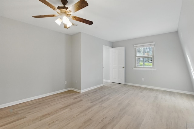 10626 Pineview Dr, Mabelvale, AR 72103 - spare room with light wood-style flooring, baseboards, and a ceiling fan