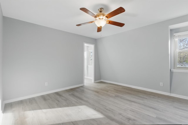 10626 Pineview Dr, Mabelvale, AR 72103 - empty room with ceiling fan, wood finished floors, and baseboards