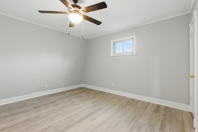 10626 Pineview Dr, Mabelvale, AR 72103 - spare room featuring ornamental molding, light wood-style floors, baseboards, and ceiling fan