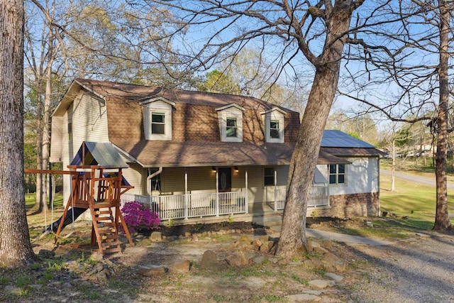 10626 Pineview Dr, Mabelvale, AR 72103 - colonial inspired home with a porch and solar panels