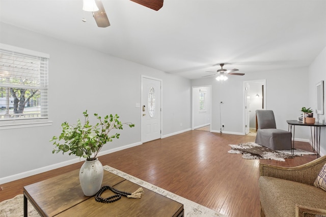 10626 Pineview Dr, Mabelvale, AR 72103 - living area featuring ceiling fan, wood finished floors, and baseboards