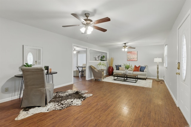 10626 Pineview Dr, Mabelvale, AR 72103 - living area with a ceiling fan, wood finished floors, and baseboards