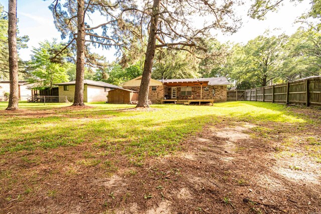 1211 Janwood St, El Dorado, AR 71730 - view of yard with a wooden deck