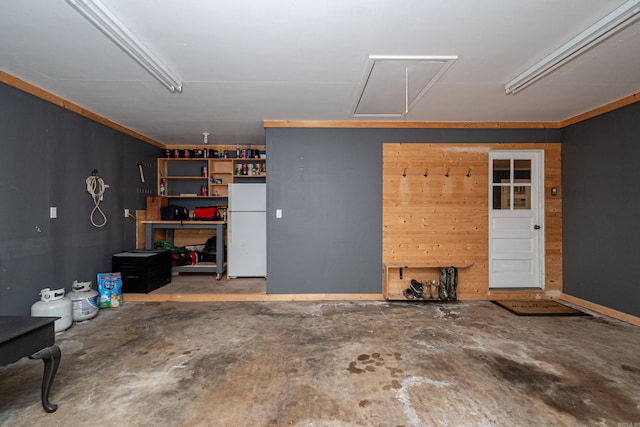 1211 Janwood St, El Dorado, AR 71730 - garage with freestanding refrigerator