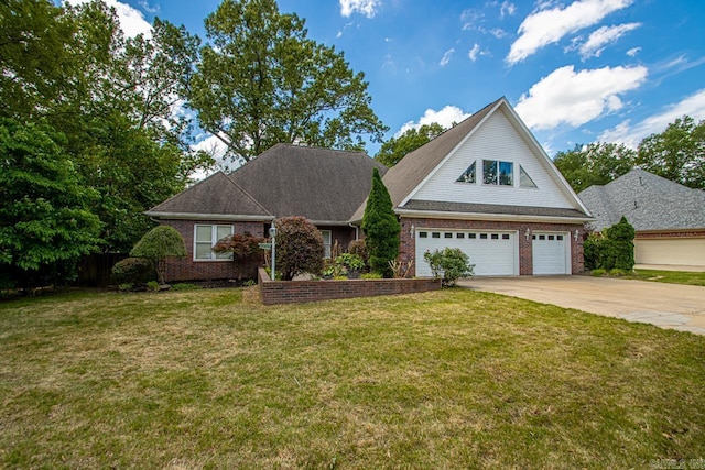 36 Brentwood Cv, Cabot, AR 72023 - view of front facade featuring driveway, brick siding, and a front lawn