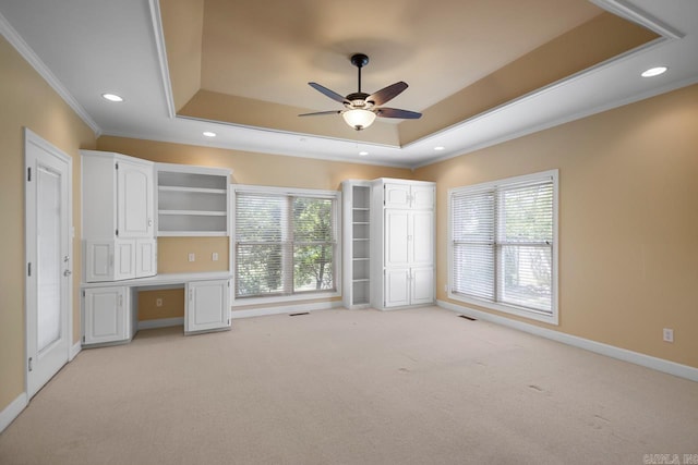36 Brentwood Cv, Cabot, AR 72023 - unfurnished bedroom featuring a tray ceiling, crown molding, light carpet, recessed lighting, and baseboards
