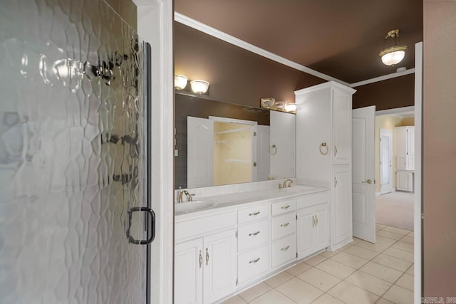 36 Brentwood Cv, Cabot, AR 72023 - full bath featuring ornamental molding, tile patterned floors, double vanity, and a stall shower
