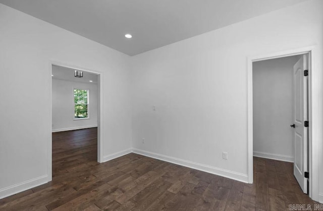 2311 S Louisiana St, Little Rock, AR 72206 - unfurnished room featuring dark wood finished floors, baseboards, and recessed lighting