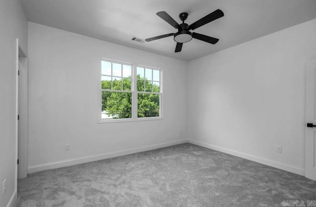 2311 S Louisiana St, Little Rock, AR 72206 - unfurnished room featuring carpet, ceiling fan, and baseboards