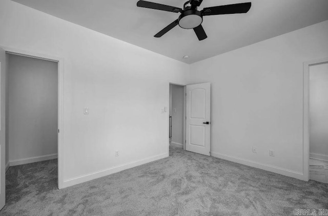 2311 S Louisiana St, Little Rock, AR 72206 - unfurnished bedroom featuring carpet floors, baseboards, and ceiling fan