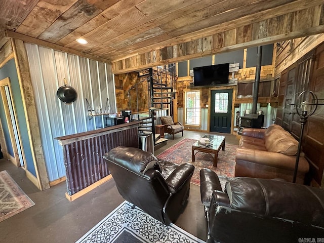 675 Nimmo, Searcy, AR 72143 - living room featuring wood ceiling, a wood stove, and wood walls