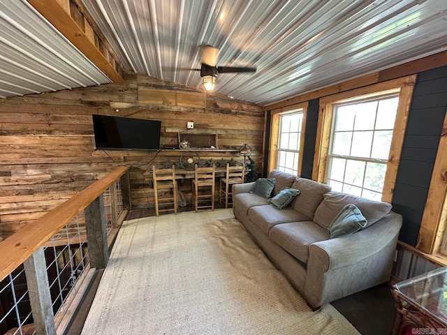 675 Nimmo, Searcy, AR 72143 - living area featuring a ceiling fan, lofted ceiling, and wooden walls