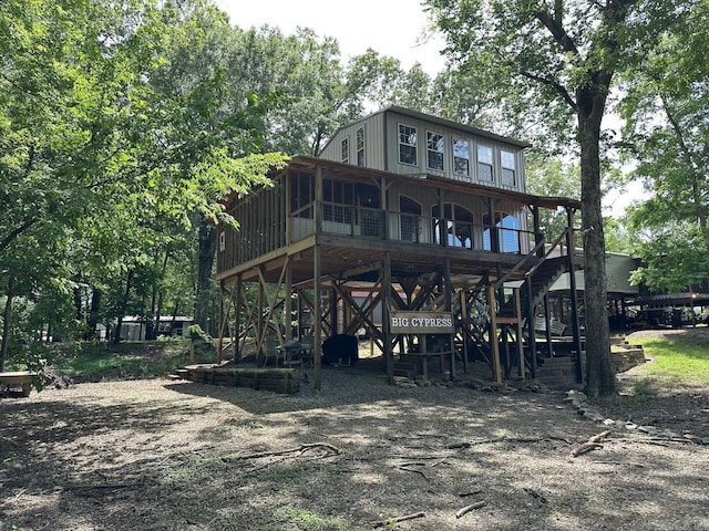 675 Nimmo, Searcy, AR 72143 - rear view of property featuring stairs