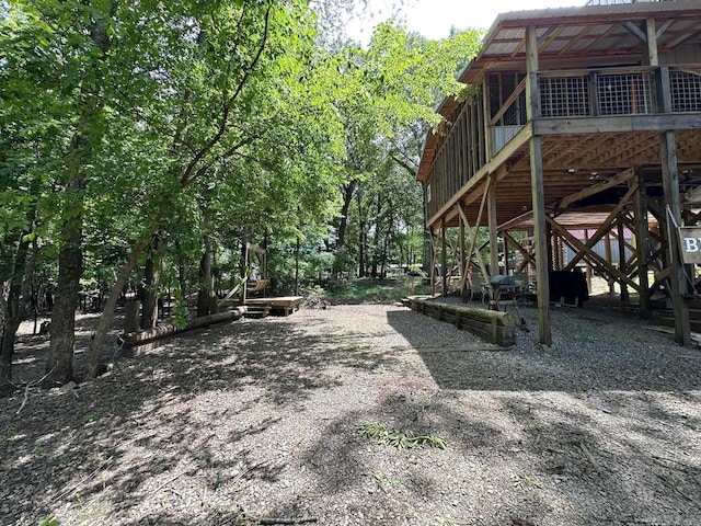 675 Nimmo, Searcy, AR 72143 - view of yard with a deck and stairway