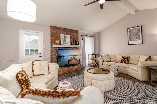 2130 Maplewood Dr, Conway, AR 73034 - living room featuring wood finished floors, a ceiling fan, and a fireplace