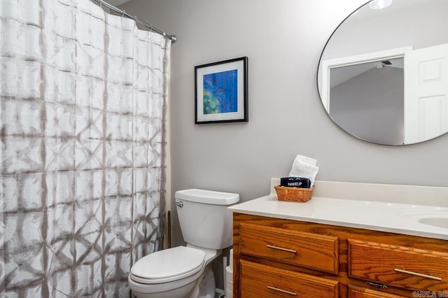 2130 Maplewood Dr, Conway, AR 73034 - full bathroom featuring vanity, toilet, and a shower with shower curtain