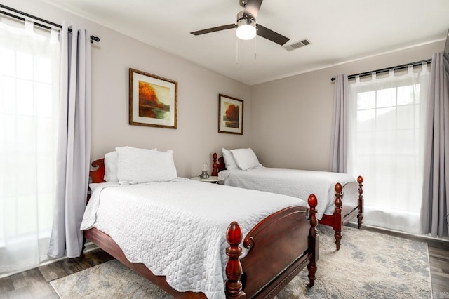 2130 Maplewood Dr, Conway, AR 73034 - bedroom featuring wood finished floors and ceiling fan