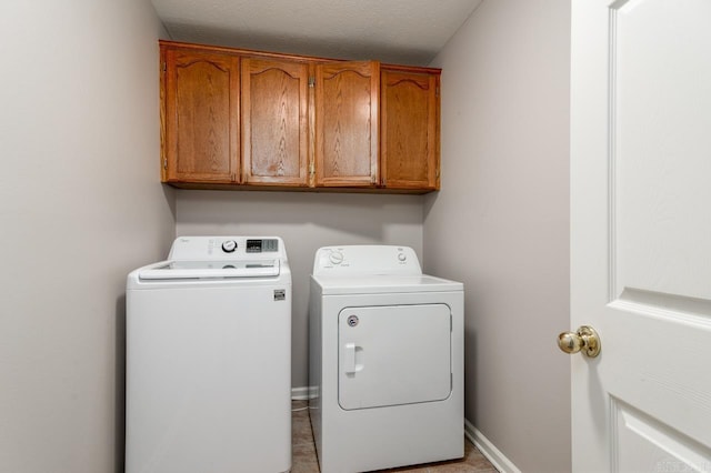 2130 Maplewood Dr, Conway, AR 73034 - laundry room with washing machine and clothes dryer and cabinet space