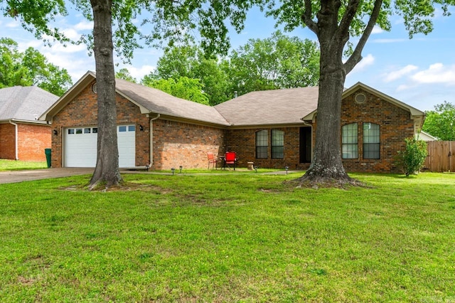 2130 Maplewood Dr, Conway, AR 73034 - single story home with an attached garage, brick siding, and driveway