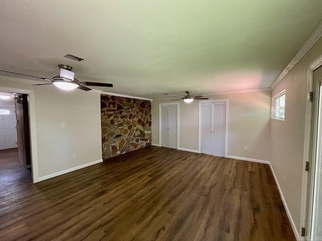 3804 Ridge Rd, North Little Rock, AR 72116 - unfurnished living room featuring a ceiling fan, dark wood finished floors, crown molding, and baseboards