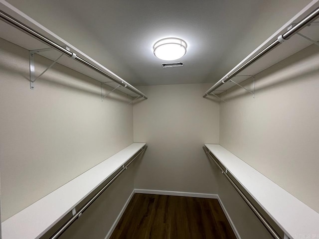 3804 Ridge Rd, North Little Rock, AR 72116 - spacious closet featuring dark wood-style flooring