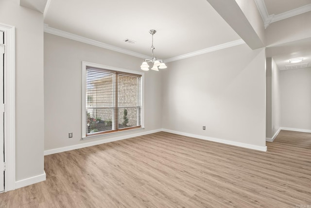 8001 Mars Hill Rd, Bauxite, AR 72011 - empty room featuring light wood finished floors, ornamental molding, baseboards, and a chandelier