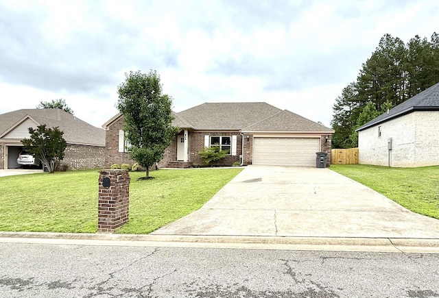604 Samuel Loyce Dr, Searcy, AR 72143 - view of front of home featuring a garage, brick siding, and driveway