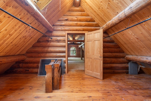 10836 Bray Rd, Elkins, AR 72727 - additional living space with wood ceiling, rustic walls, and wood-type flooring