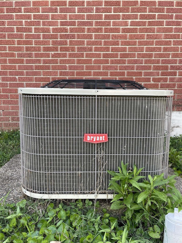 101 Chula Vista Rd, El Dorado Springs, AR 71730 - exterior view of central AC unit and brick siding