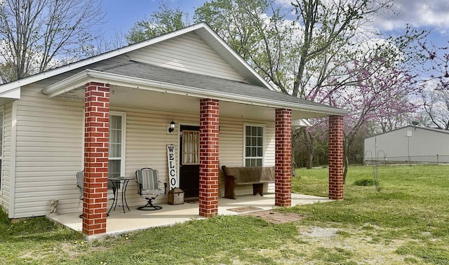21 Sharp St, Ash Flat, AR 72513 - view of front of home with roof with shingles, covered porch, and brick siding