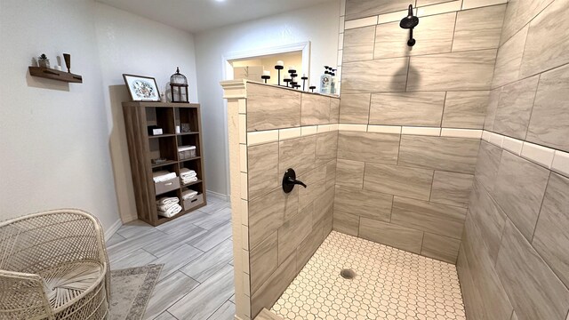 21 Sharp St, Ash Flat, AR 72513 - bathroom with tiled shower and baseboards