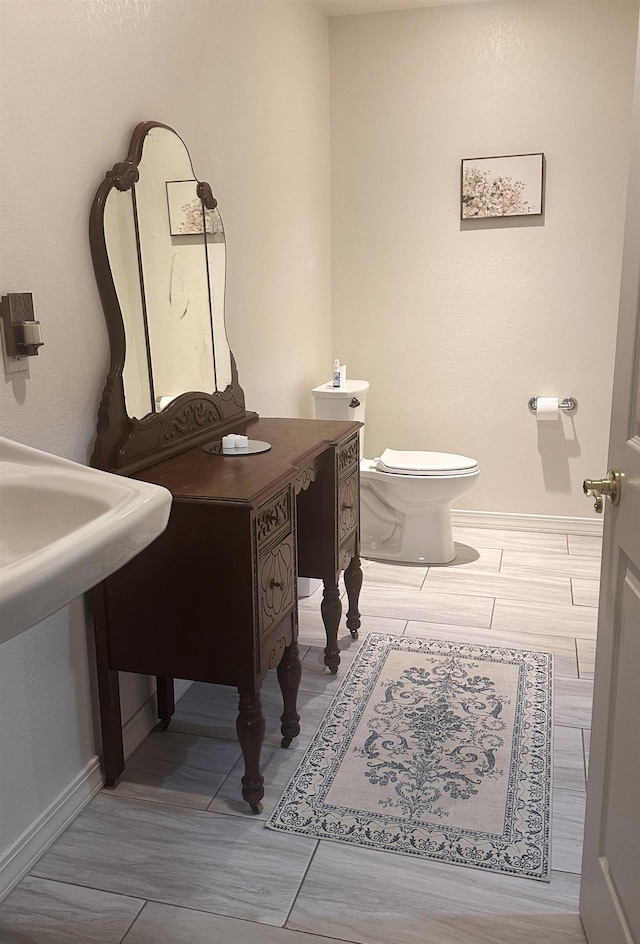 21 Sharp St, Ash Flat, AR 72513 - half bath featuring toilet and baseboards