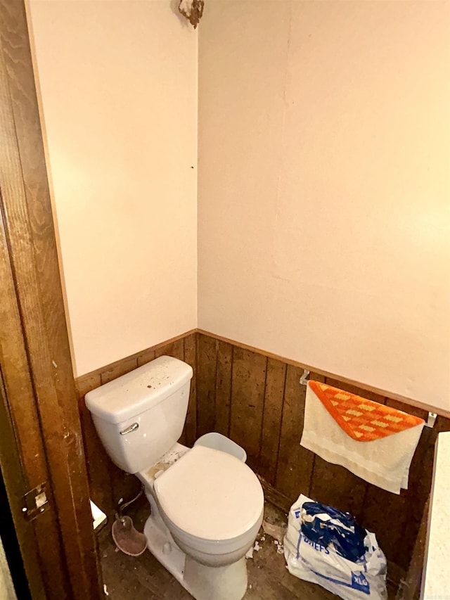 4109 Garrison Rd, Little Rock, AR 72223 - bathroom with toilet and a wainscoted wall