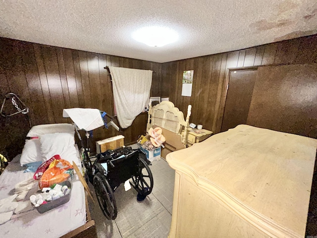 4109 Garrison Rd, Little Rock, AR 72223 - carpeted bedroom with a textured ceiling and wooden walls