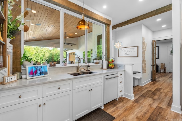 2995 Cresthaven St, Conway, AR 72034 - bar featuring a sink, white dishwasher, light wood finished floors, hanging light fixtures, and ceiling fan