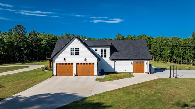 2995 Cresthaven St, Conway, AR 72034 - view of front of house with a front yard, concrete driveway, an attached garage, and roof with shingles