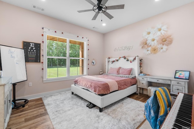 2995 Cresthaven St, Conway, AR 72034 - bedroom featuring wood finished floors, baseboards, recessed lighting, and a ceiling fan