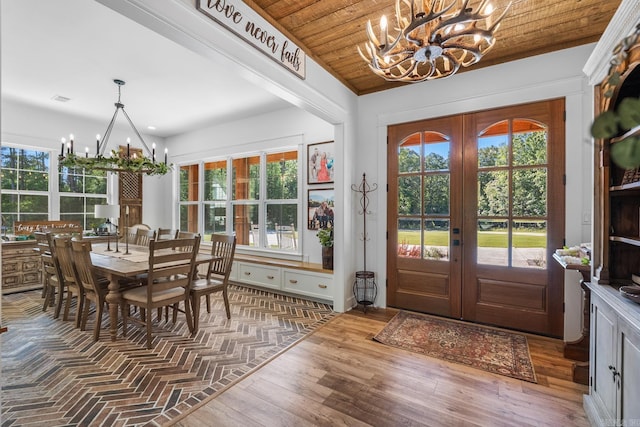 2995 Cresthaven St, Conway, AR 72034 - dining room featuring a chandelier, french doors, healthy amount of natural light, and wood ceiling