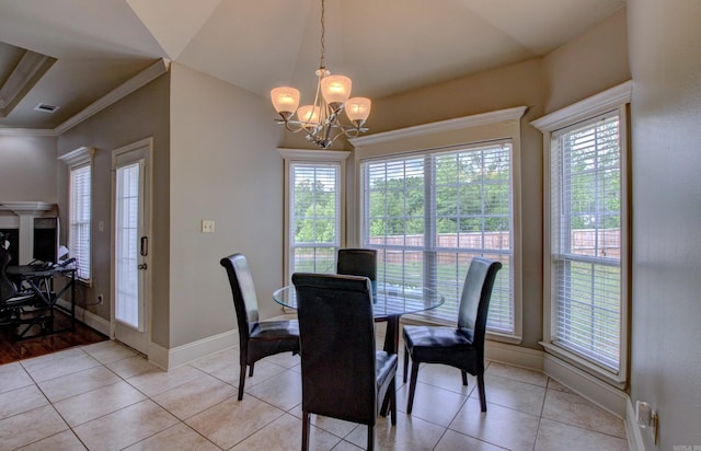 76 Woodridge Dr, Little Rock, AR 72204 - dining room with a chandelier, baseboards, light tile patterned floors, and ornamental molding