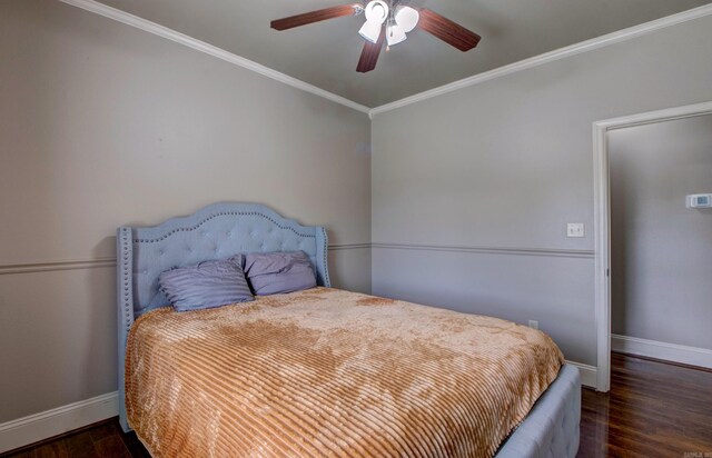 76 Woodridge Dr, Little Rock, AR 72204 - bedroom with baseboards, wood finished floors, crown molding, and a ceiling fan