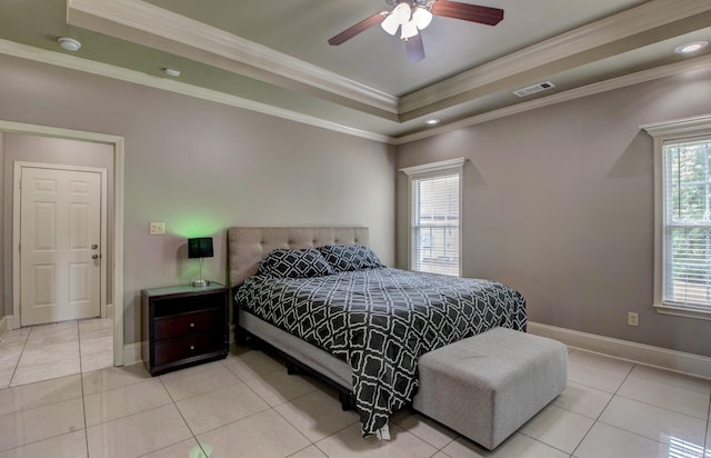 76 Woodridge Dr, Little Rock, AR 72204 - tiled bedroom with crown molding, multiple windows, a tray ceiling, baseboards, and recessed lighting