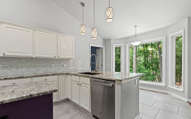 74 Medina Way, Hot Springs Village, AR 71909 - kitchen with stainless steel dishwasher, a sink, healthy amount of natural light, lofted ceiling, and decorative backsplash