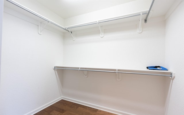 74 Medina Way, Hot Springs Village, AR 71909 - spacious closet featuring dark wood-style flooring
