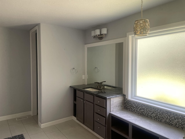 74 Medina Way, Hot Springs Village, AR 71909 - bathroom with tile patterned flooring, vanity, and baseboards