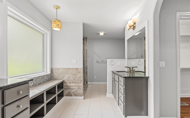 74 Medina Way, Hot Springs Village, AR 71909 - full bath with a spacious closet, vanity, a stall shower, and tile patterned floors