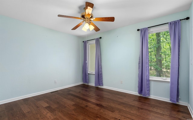 74 Medina Way, Hot Springs Village, AR 71909 - spare room featuring wood finished floors, ceiling fan, and baseboards